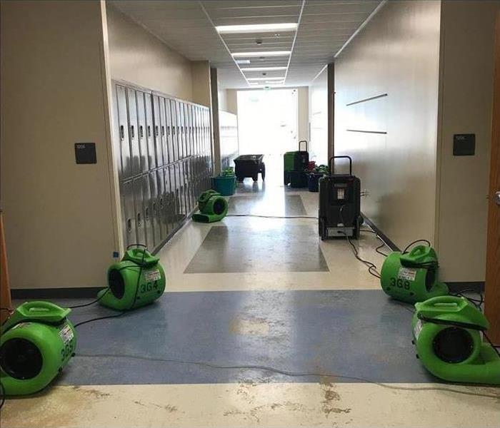 Air mover placed on a hallway school